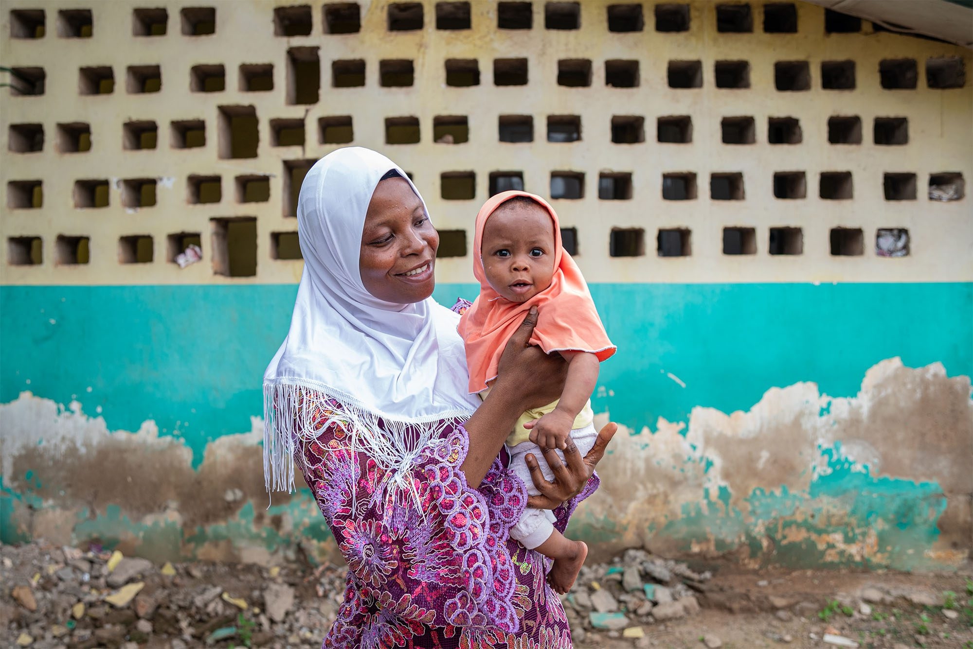 A mother holding her child